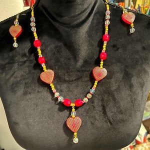 Heart jewelry set is red and gold. Perfect Valentine comes beautifully wrapped!